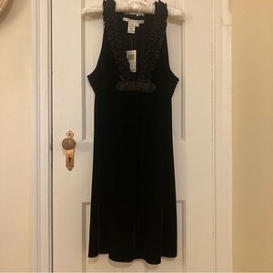 Max Studio black velvet cocktail dress with satin ruffle detail
